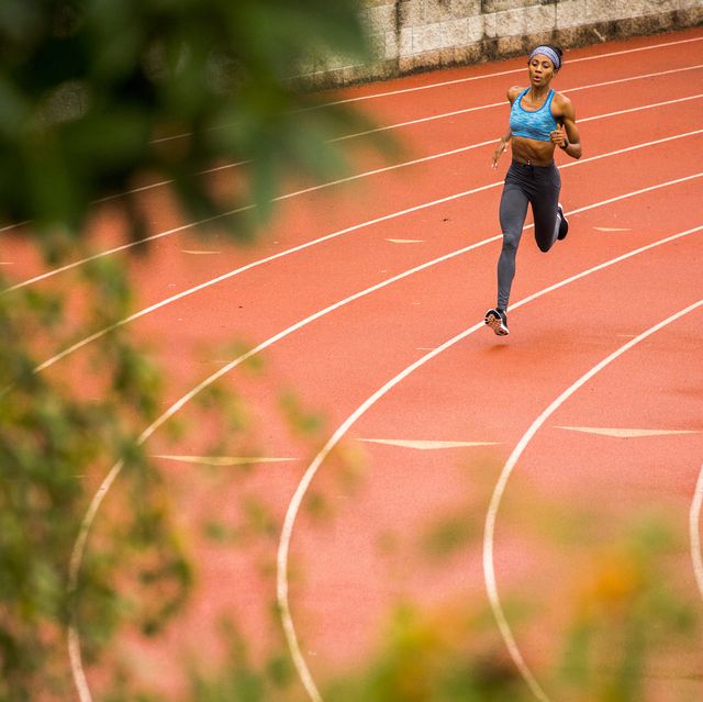 black woman running on track