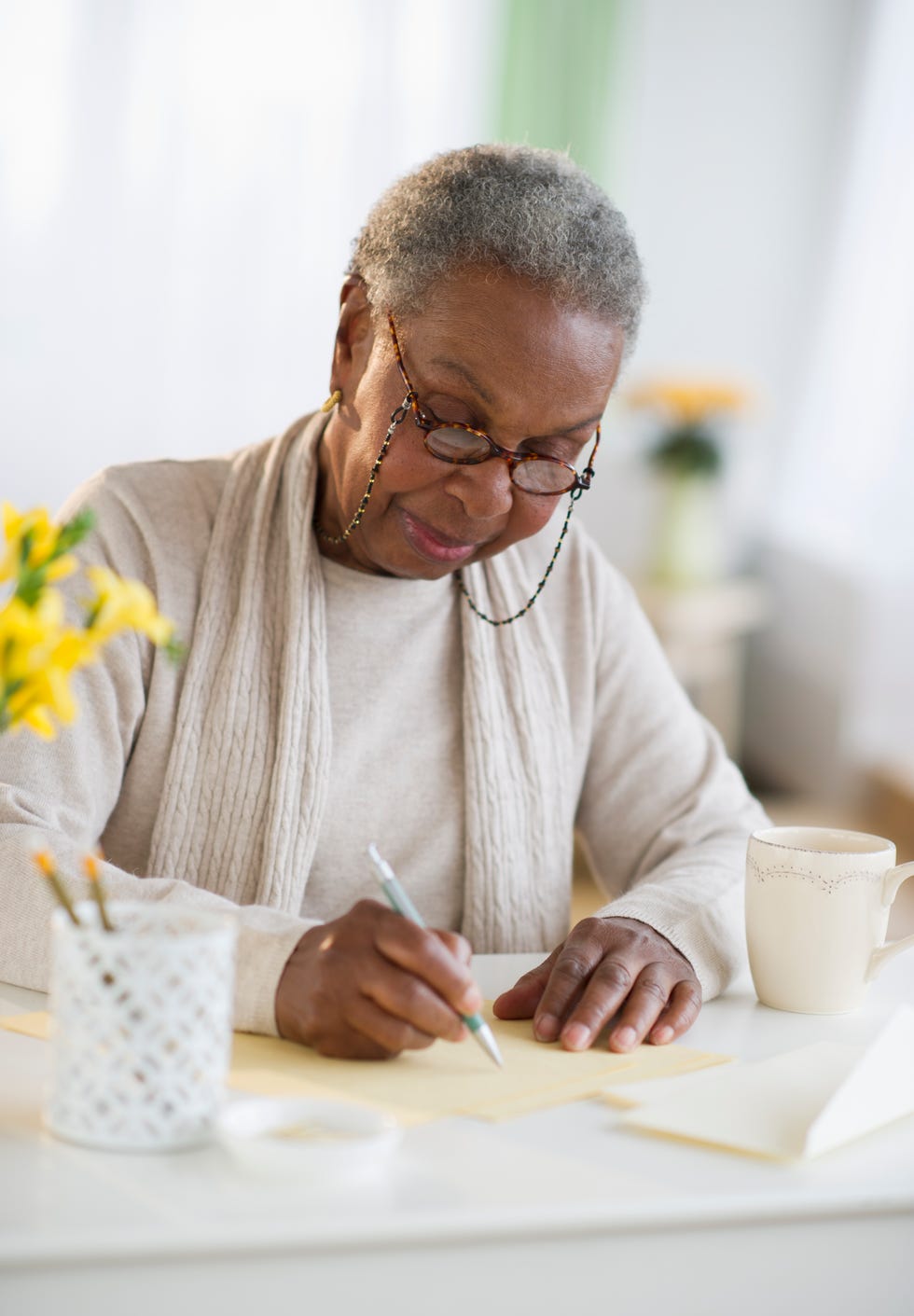 black woman writing letter