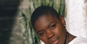 black young woman looking at camera
