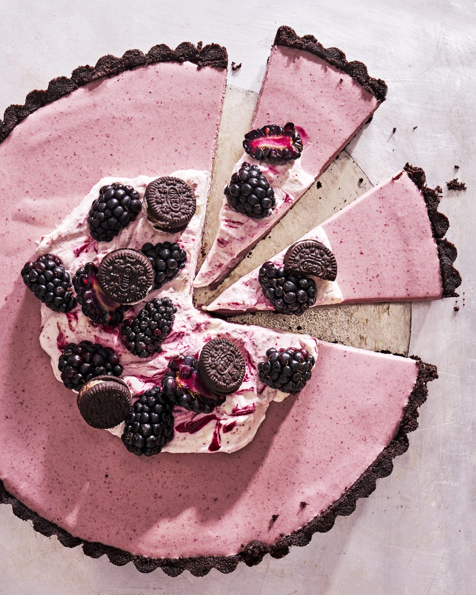 no baked blackberry oreo tart with mascrapone whipped cream and blackberry filling and an oreo crust