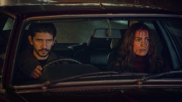 Two people sitting in a car with focus on the interior and the mood