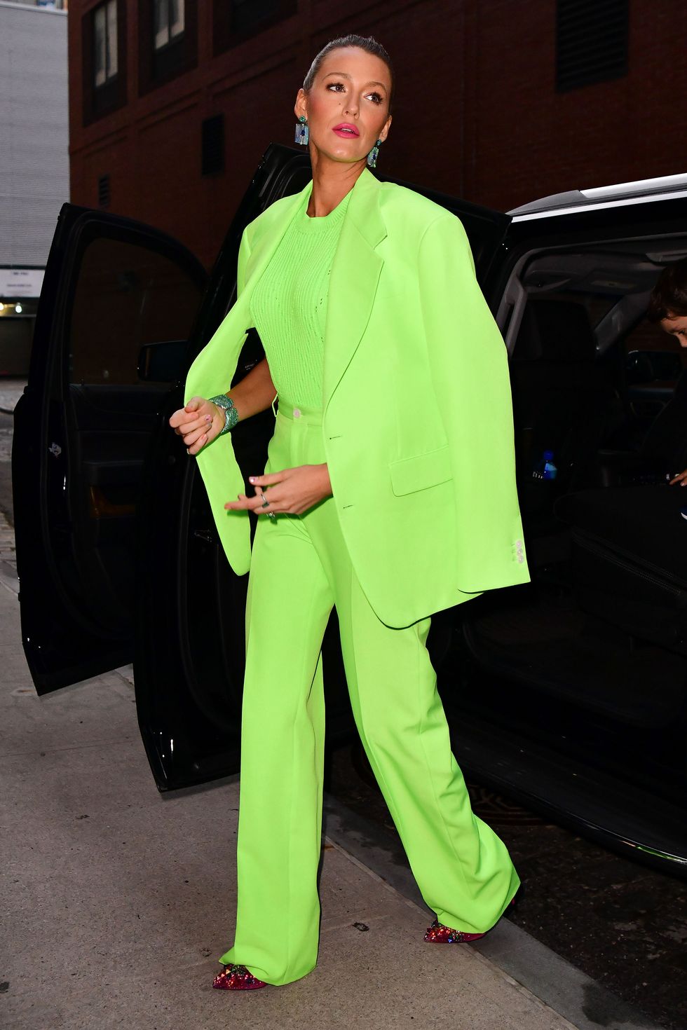 Blake Lively steps out in a neon-green suit