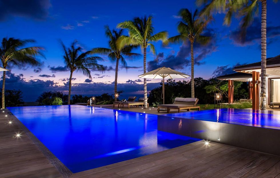 Swimming pool, Resort, Sky, Property, Lighting, Real estate, Vacation, Tree, Palm tree, Tropics, 