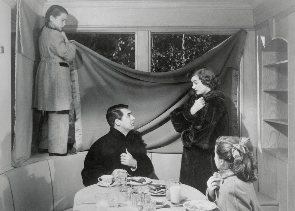 (original caption) a different kind of comedy team a switch from hope and carroll was that of cary grant and myrna loy. frank and panama wrote the screenplay and produced mr. blandings builds his dream house which was a particularly enjoyable romp for the glamorous duo. here, loy and grant are shown in a scene from the movie.