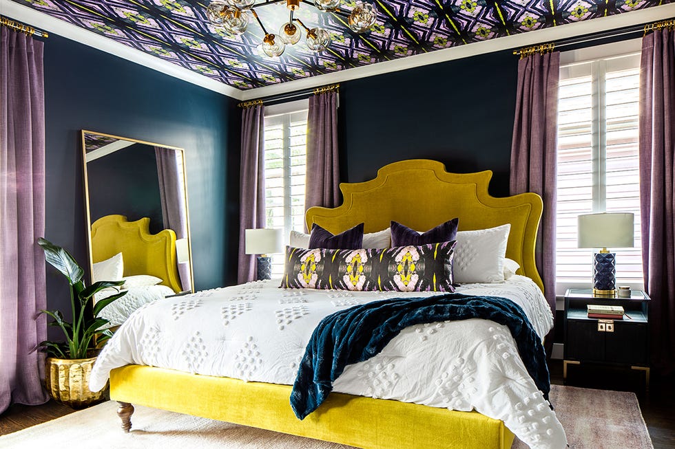 bedroom with purple curtains