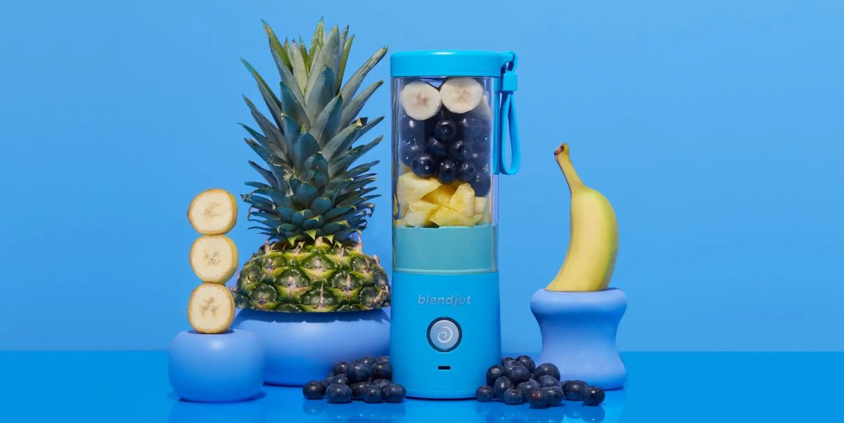 blendjet 2 personal blender with pineapple bananas and blueberries