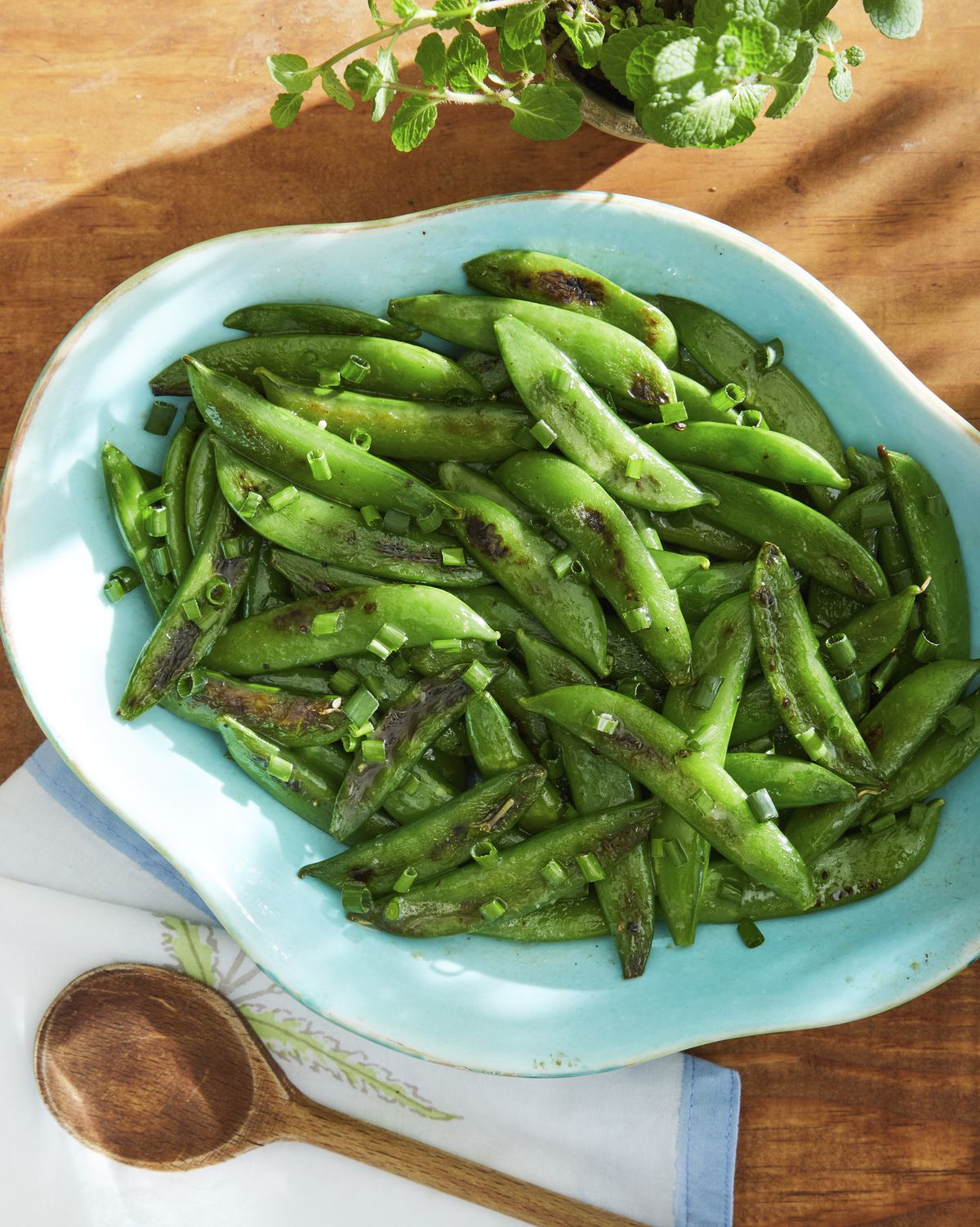 blistered snap peas with brown butter and chives