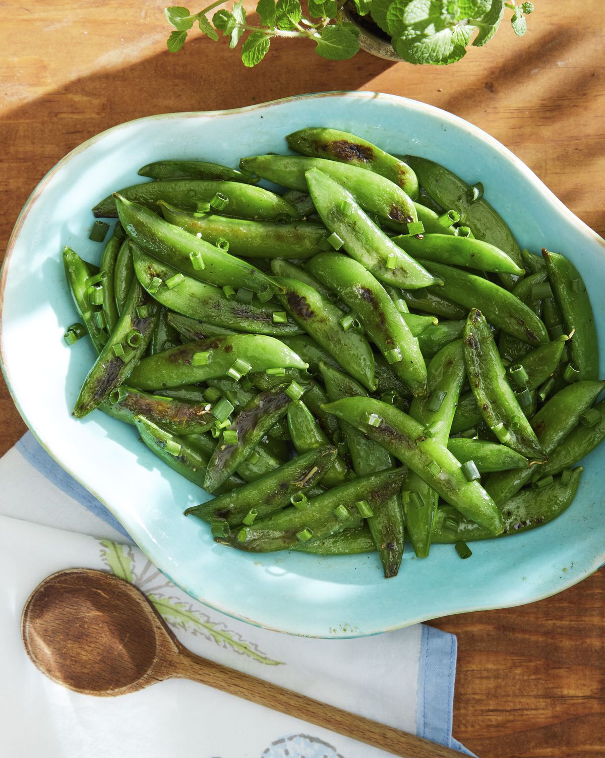 blistered snap peas with brown butter and chives