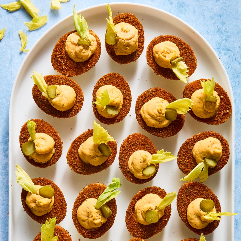 bloody mary deviled eggs with old bay seasoning and celery