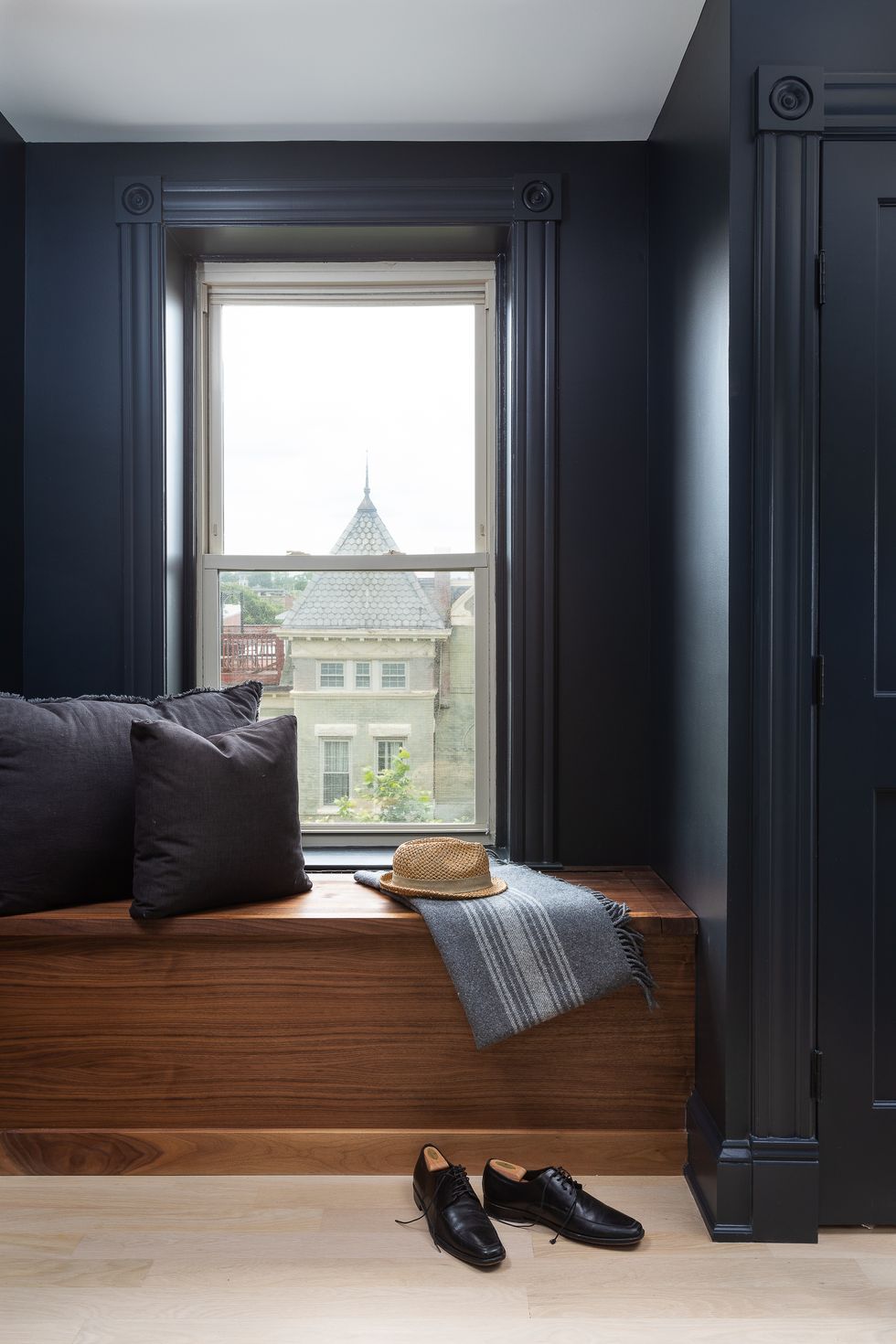 dark blue and wood window seat