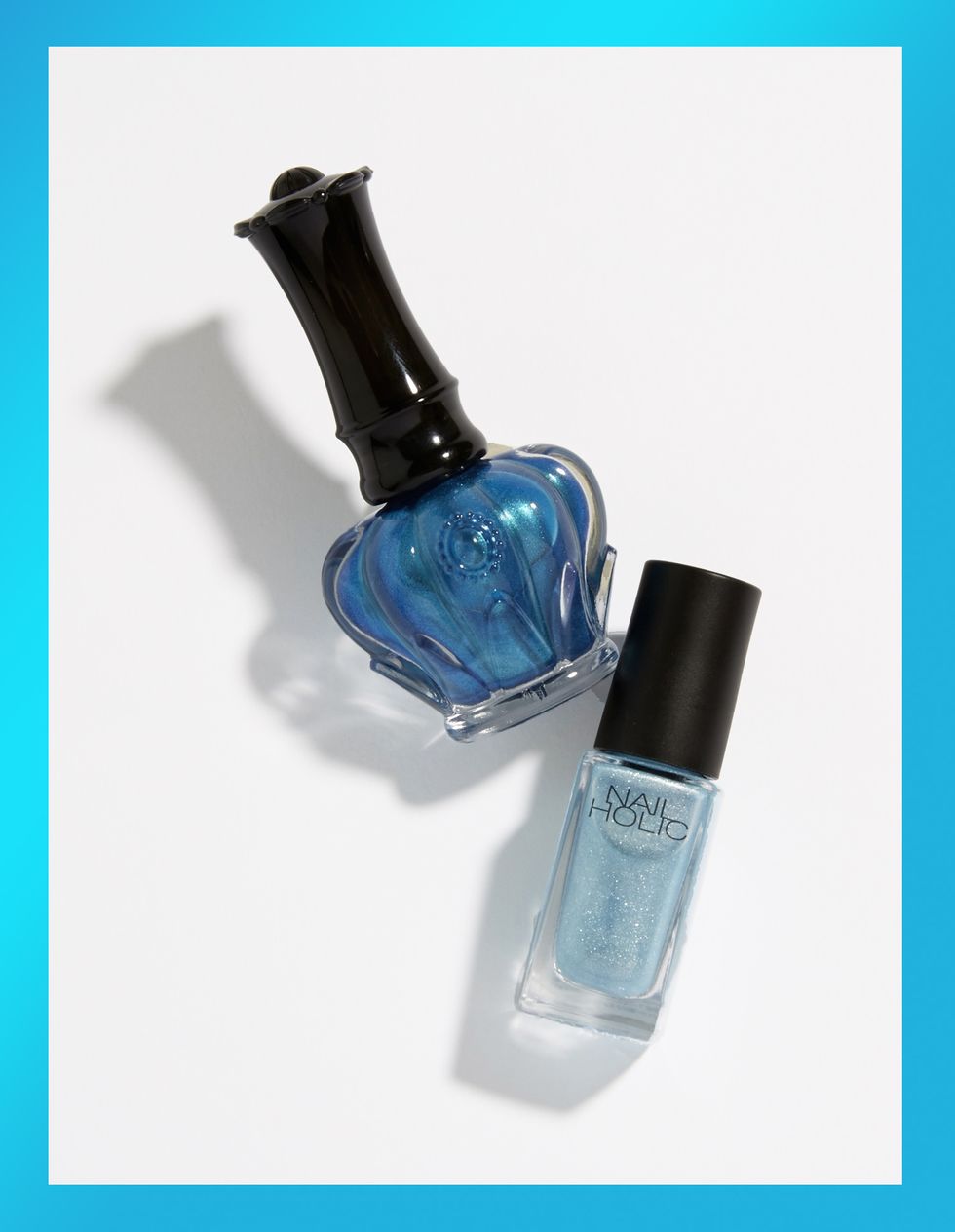 Blue, Product, Turquoise, Bottle, Liquid, Water, Nail polish, Glass bottle, Nail care, Material property, 
