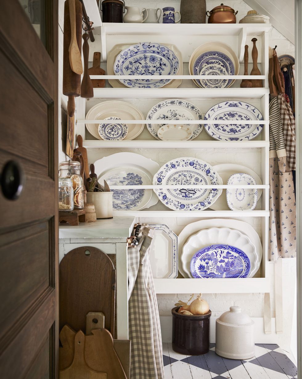 a 1920s bungalow pantry with blue and white platters