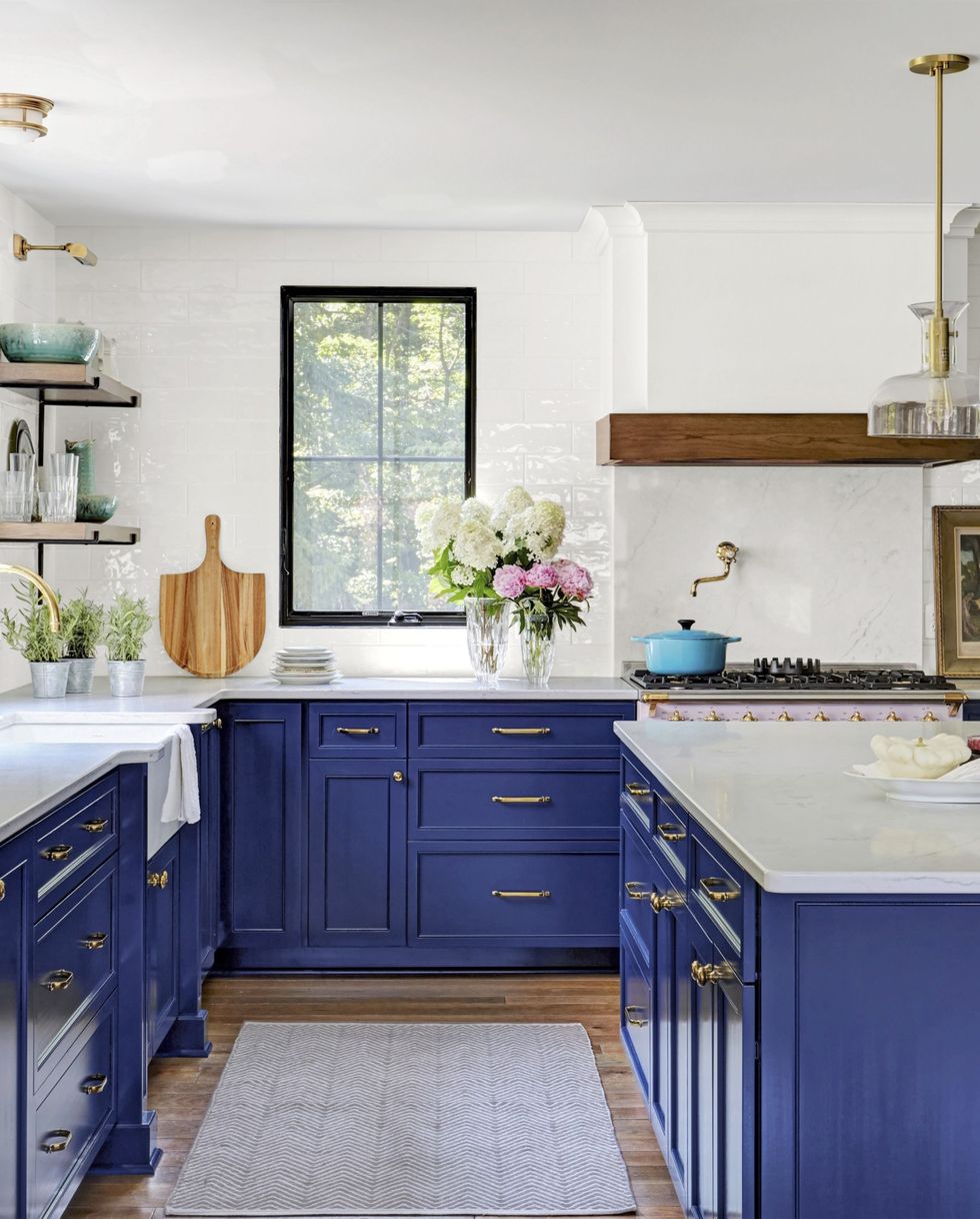 blue cabinets gold hardware kitchen idea