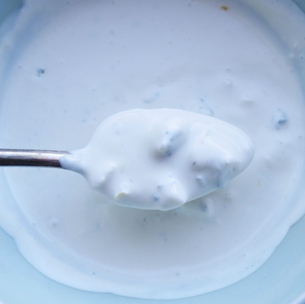 creamy white blue cheese dressing in a blue bowl