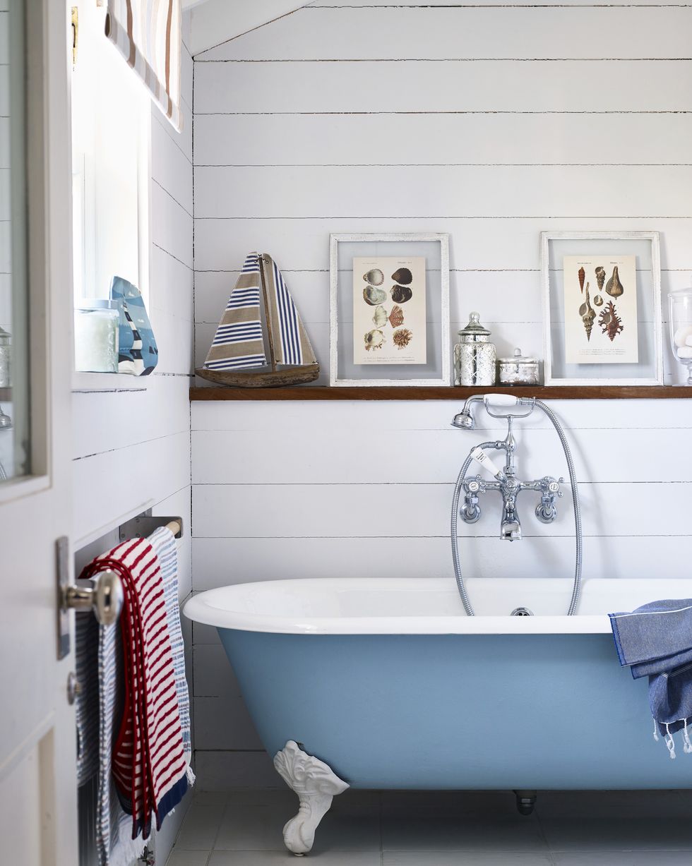 blue clawfoot tub - coastal bathroom