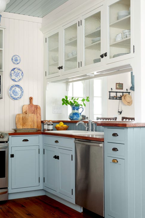 Beach house kitchen with sky blue cabinets