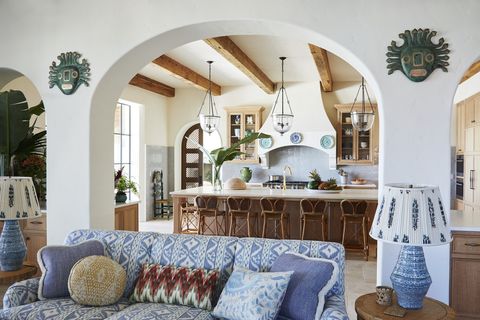 sea island, georgia home by sara gilbane and thad truett kitchen addison mizner–inspired beams and hand forged iron bell jar lighting by formations balance the kitchen’s shimmering tilework mosaic house countertops,
caesarston
