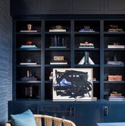 blue living room with books blue living rooms