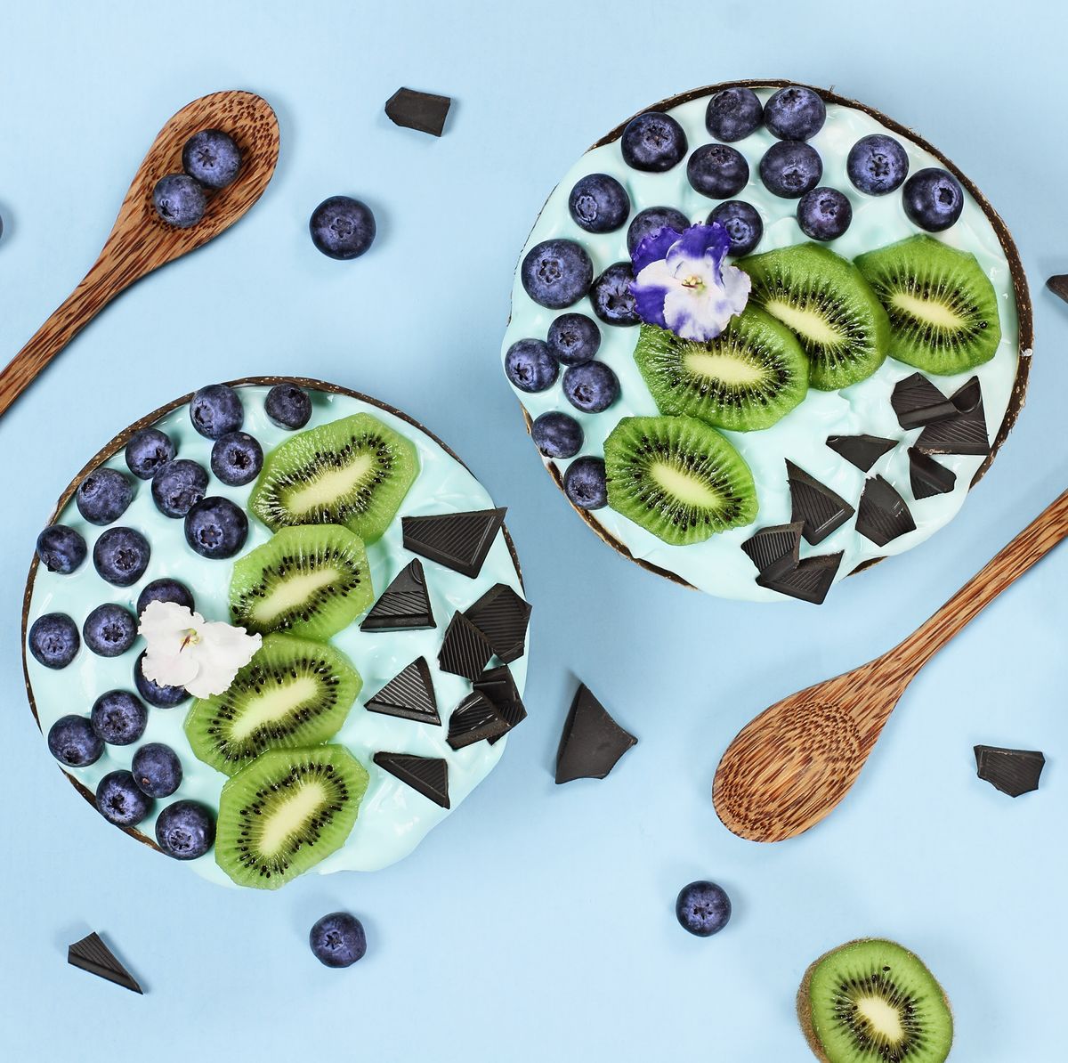 Blue Spirulina and Berry Smoothie Bowl with Blueberries Kiwi and Chocolate
