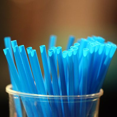 Blue straws in a glass. France.