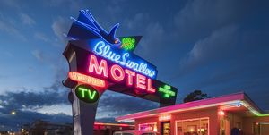 blue swallow motel at dusk