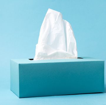 blue tissue box on a blue background