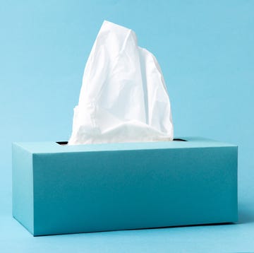 blue tissue box on a blue background