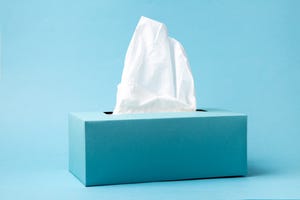 blue tissue box on a blue background