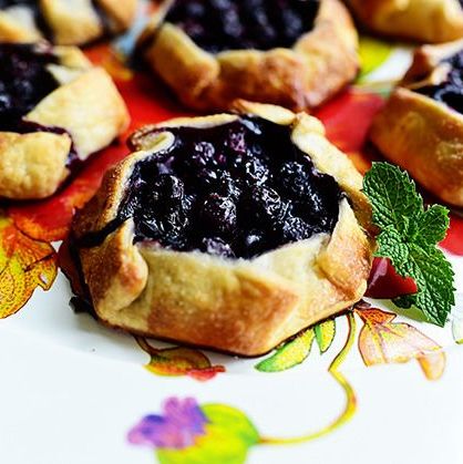 mini blueberry galettes on floral plate