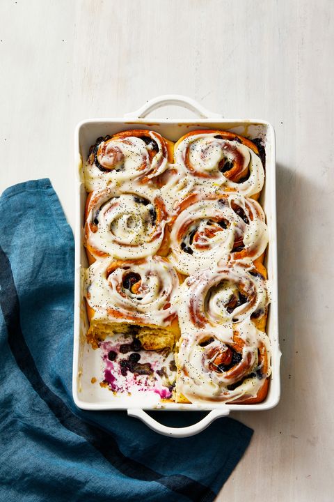 blueberry sweet rolls with lemon in a white baking dish