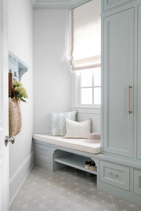 mudroom in a corner with a window