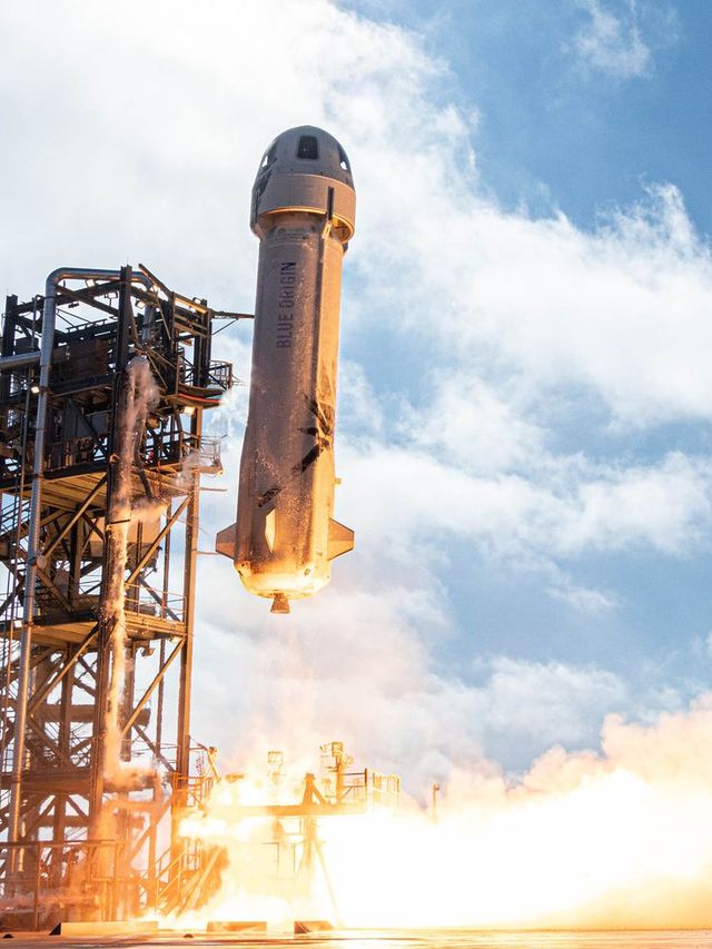 blue origin's new shepard rocket lifts off