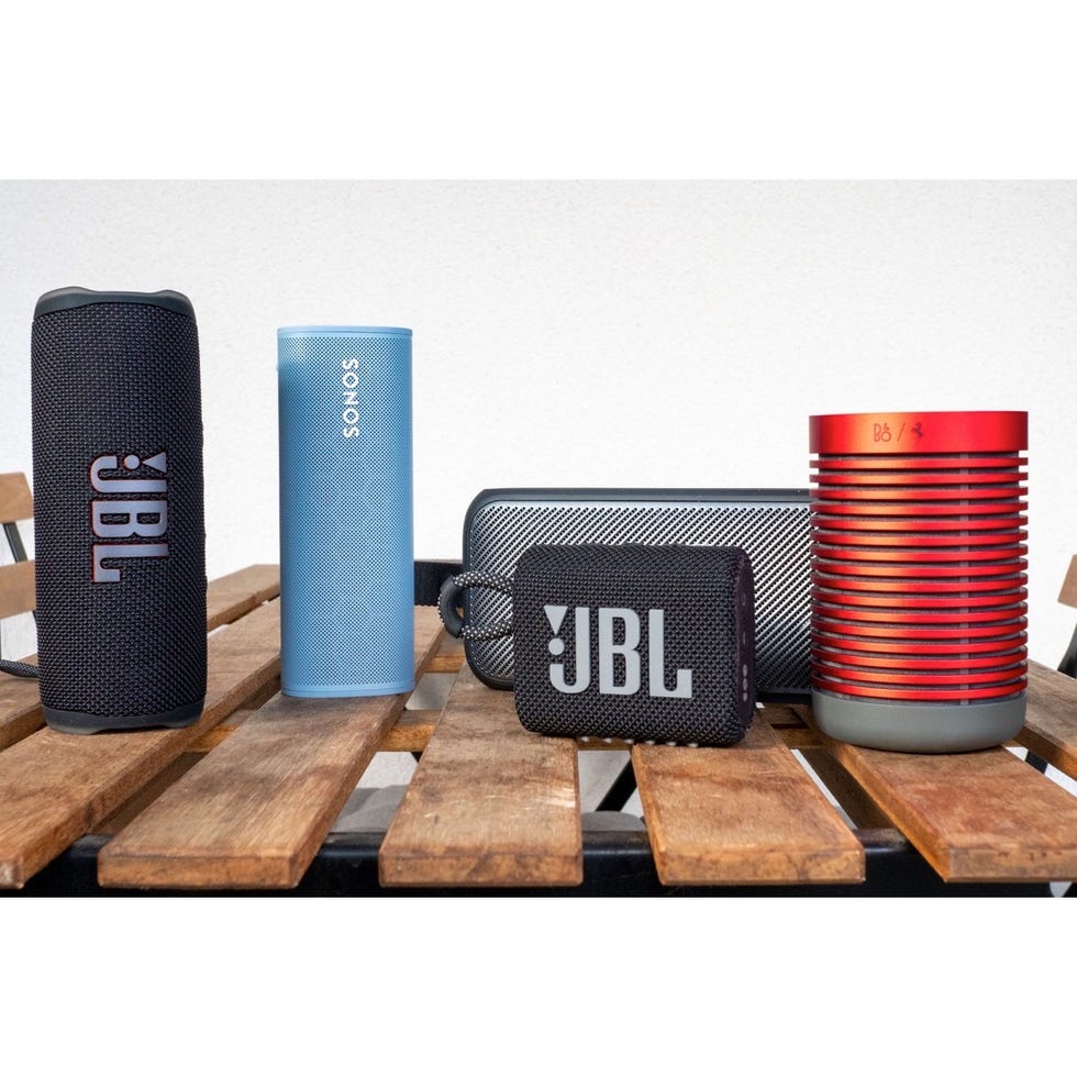 a group of portable bluetooth speakers