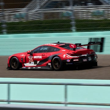 a red race car on a track