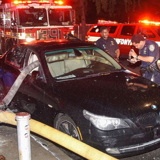 firefighters smash window of bmw parked in front of hydrant