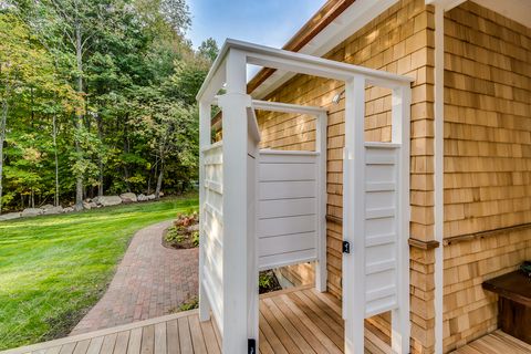 white board and batten outdoor shower enclosure