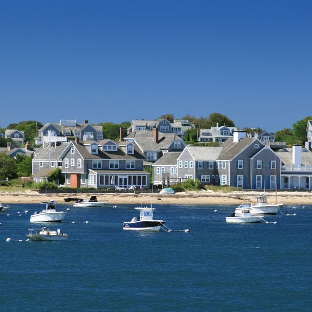 boats and waterfront houses, nantucket, massachusetts clear blue sky