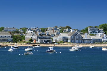 boats and waterfront houses, nantucket, massachusetts clear blue sky