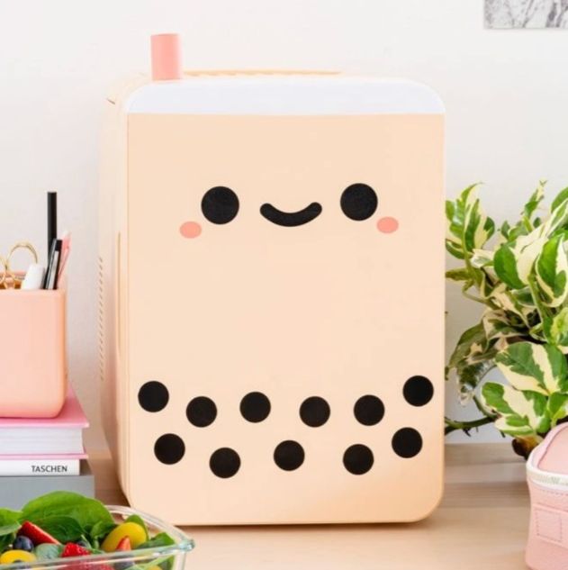 mini fridge with a smiley face on it