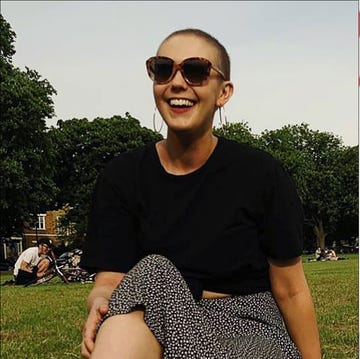 two women going through cancer treatment without their wigs on