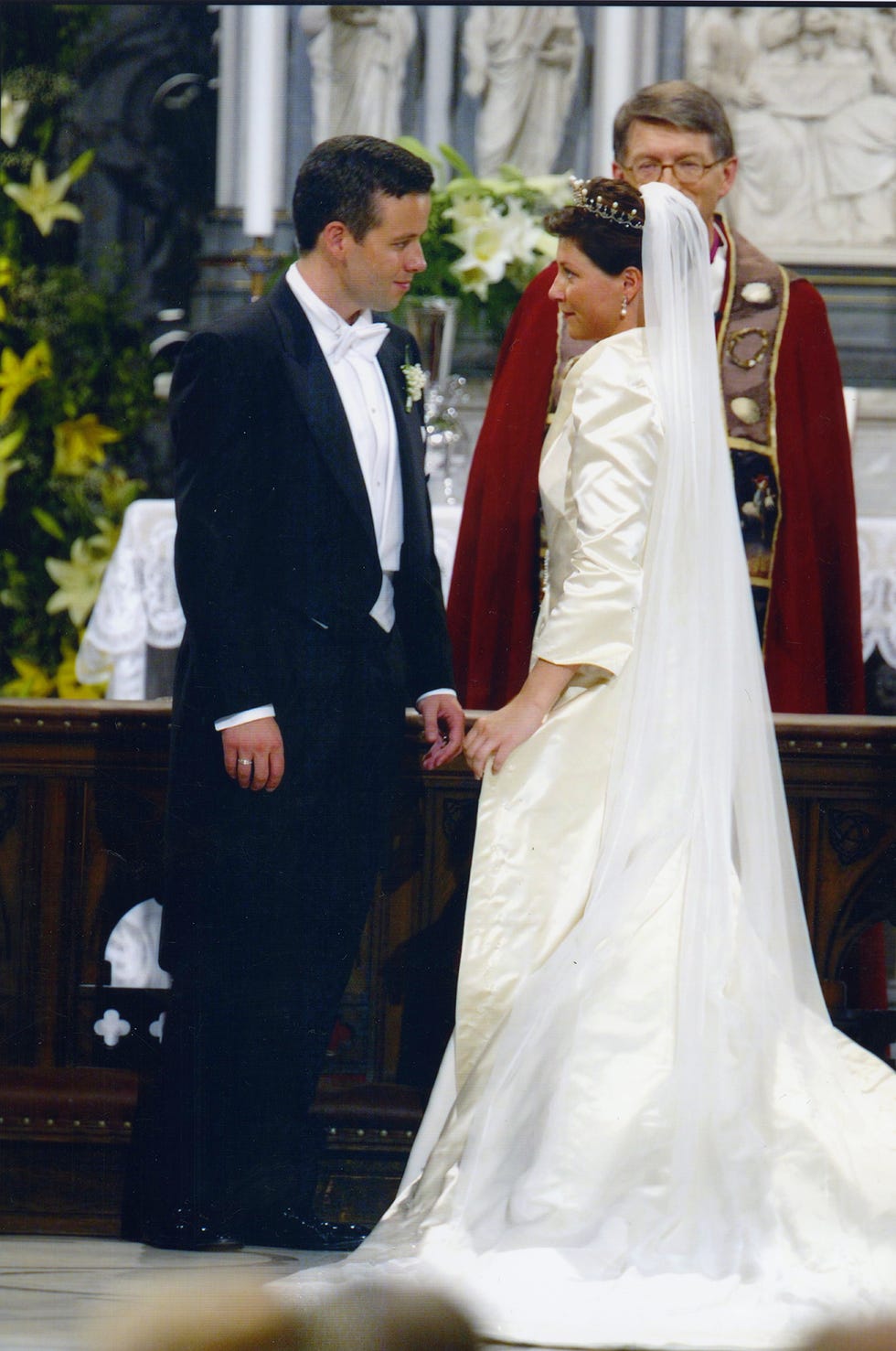 NORWEGIAN PRINCESS MARTHA LOUISE AND HER HUSBAND ARI BEHN WAVE AFTER WEDDING AT STIFTSGARDEN ROYAL PALACE IN TRONDHEIM