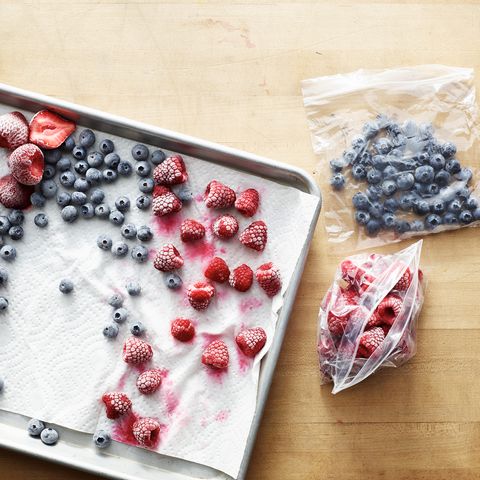 baking sheet with frozen strawberries, blueberries, and raspberries