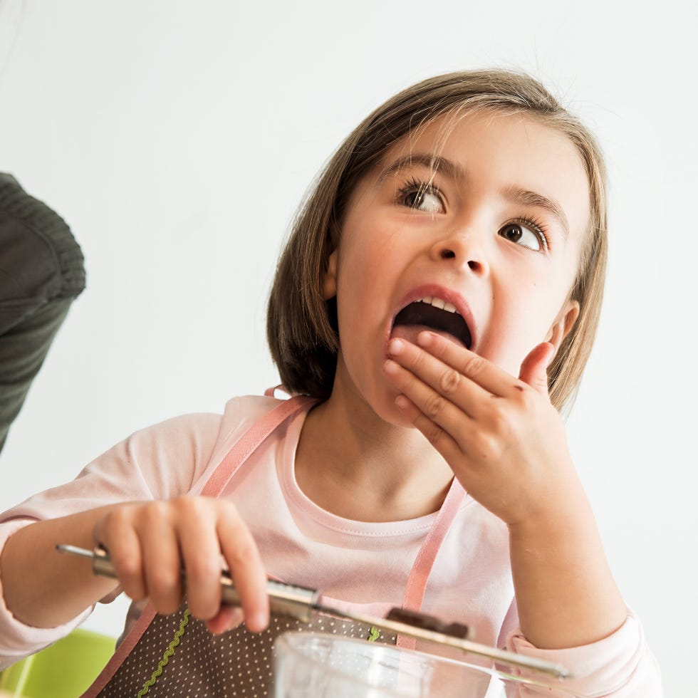 kid tasting lemon zest
