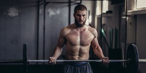 bodybuilder exercising in the gym