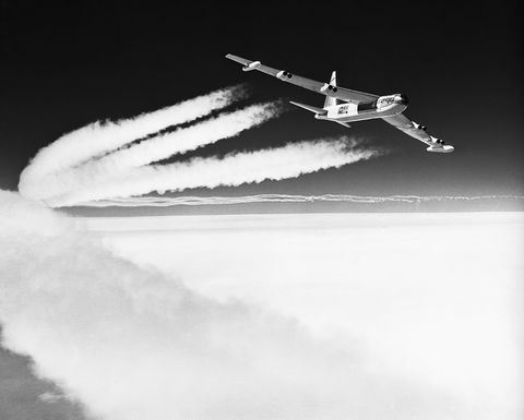 Boeing B-52 Bomber in Flight with Contrails