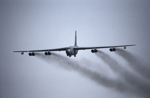 usaf boeing b 52 stratofortress with black smoke from engines after take off and undercarriage retracting
