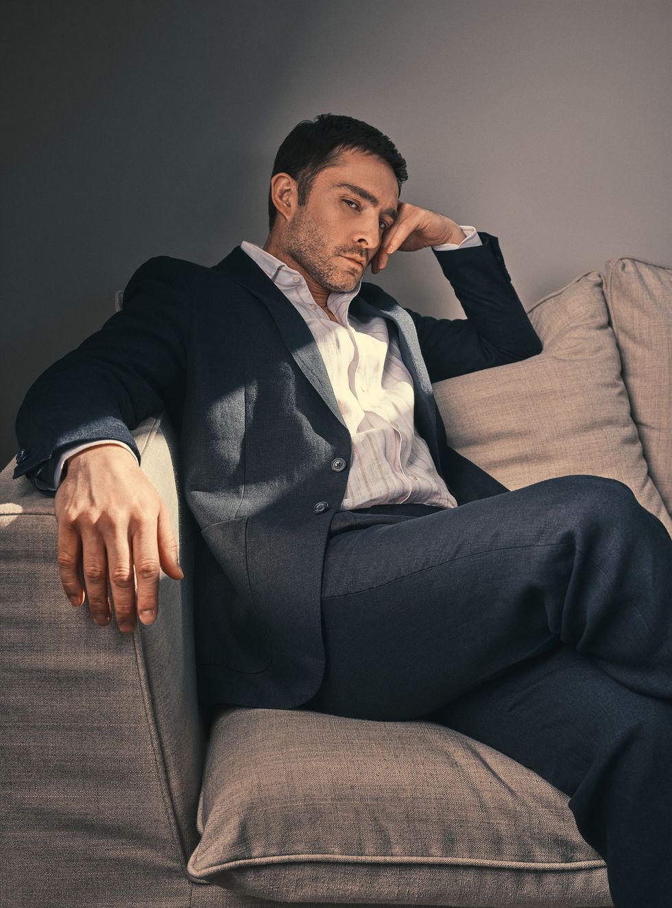 a man sitting on a couch