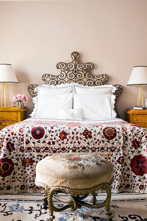 polished bohemian bedroom with blush paint walls