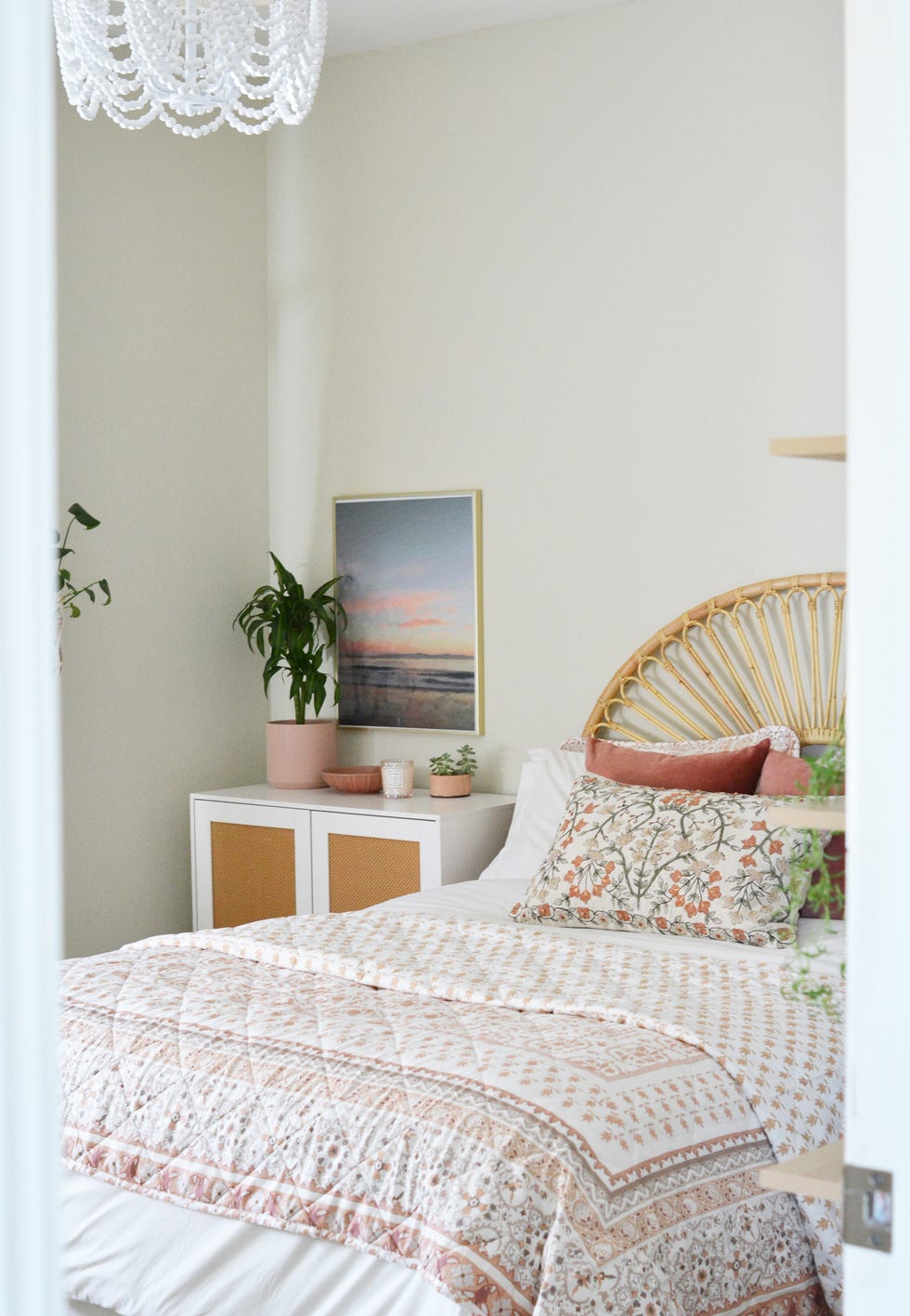 boho bedroom with rattan headboard