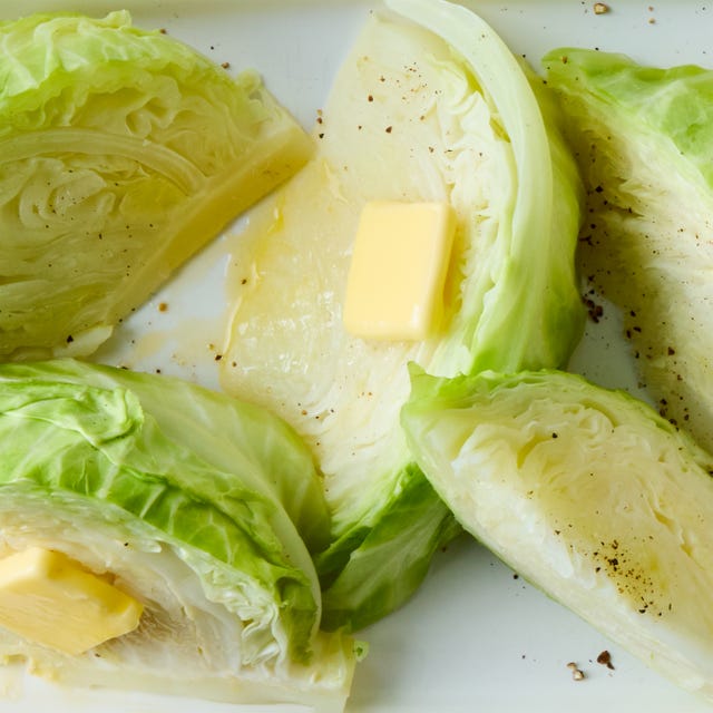 boiled cabbage topped with salt, pepper, and butter